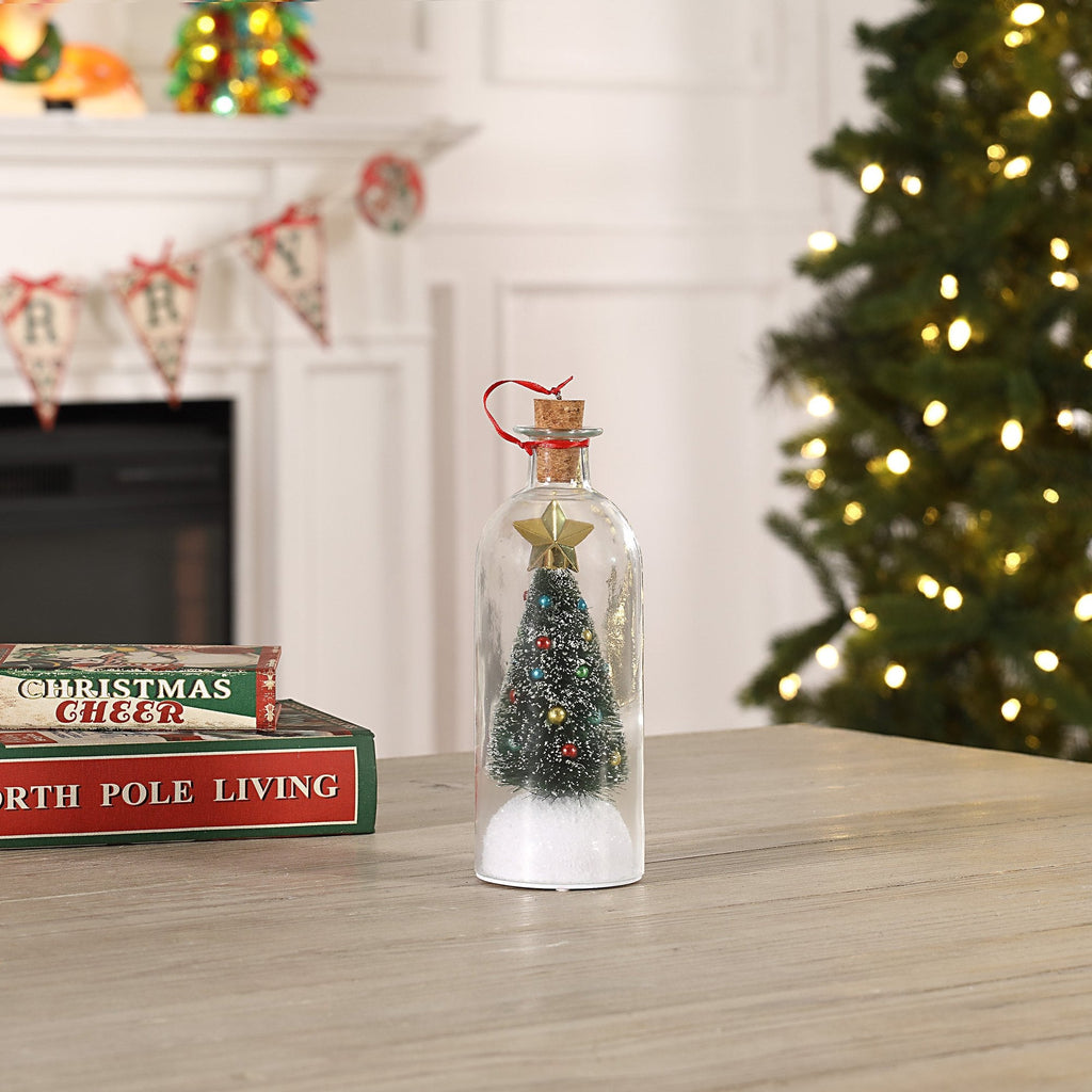 Recordable Christmas tree bottle styled as holiday mantel decor