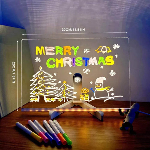 LED drawing board glowing Merry Christmas message with neon markers