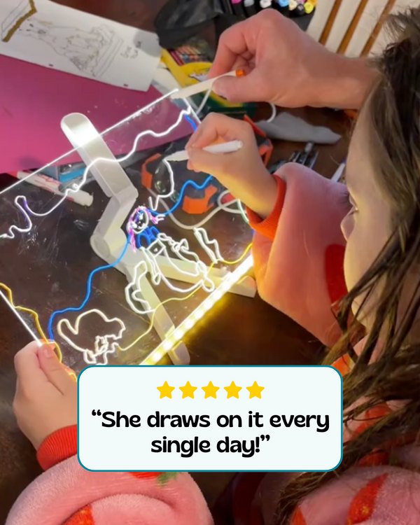 Little girl drawing every day with LumiPens neon markers