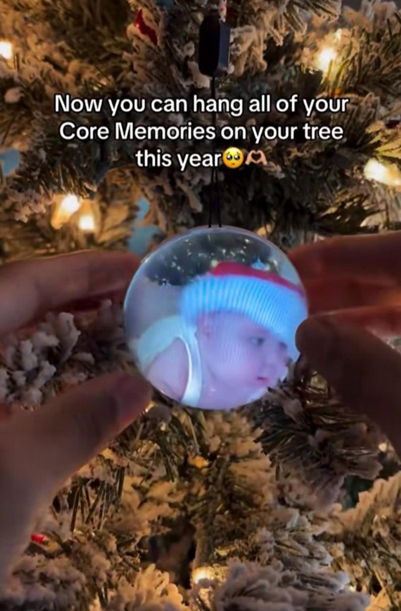 A unique keepsake gift video globe in white and black